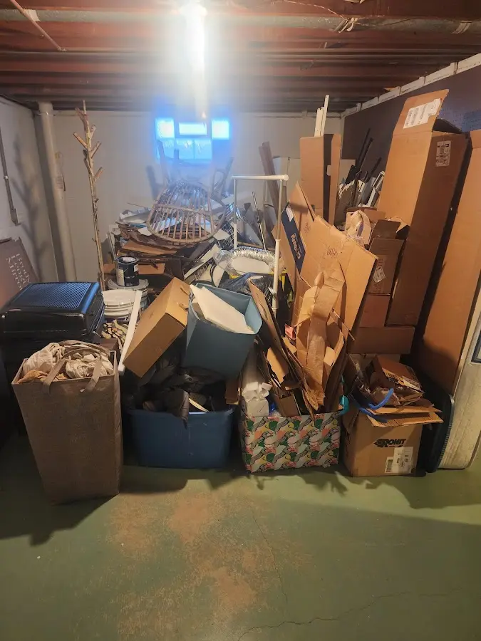 Roll-off dumpster container at job site for 20 Yard Dumpster Rental in Zachary